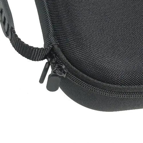 Black, textured hard-shell carrying case with a reinforced handle and durable zipper closure.