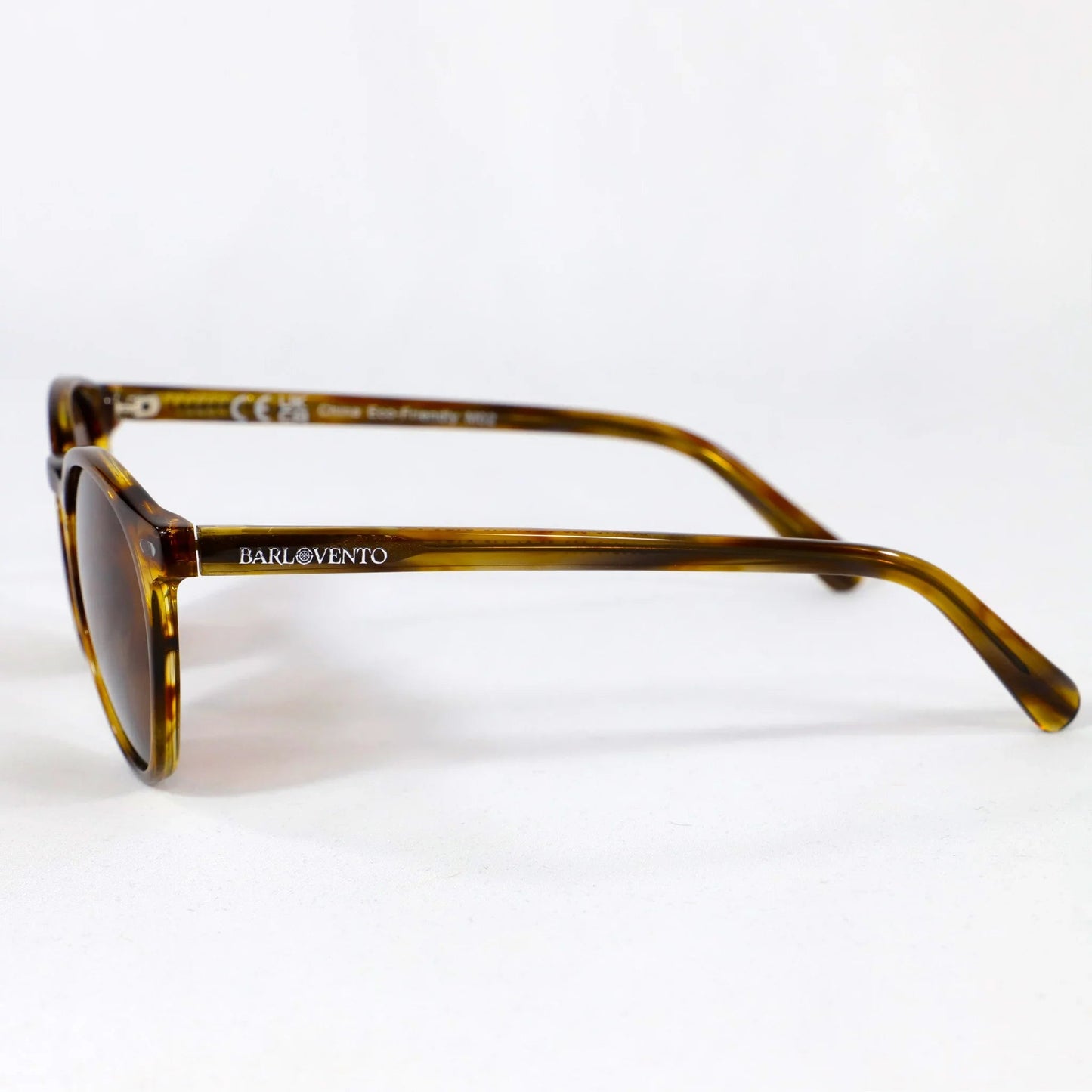 Torimbia · gafas de sol redondas de color naranja cristal con lentes marrones