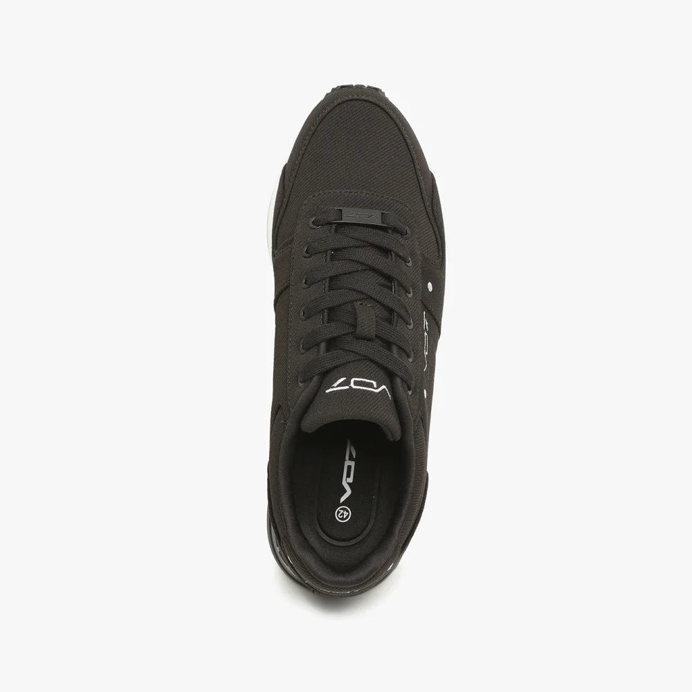 Basket VO7 Milan 10 noire en toile texturée avec lacets assortis, logo blanc sur la languette et vue de dessus.